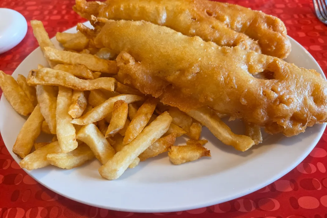 Halibut and chips in light, crunchy golden batter at Golden Fish & Chips in Hamilton